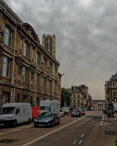Street view toward the Musee des Beaux-Arts de Rouen, with its Gothic tower visible above the rooftops.