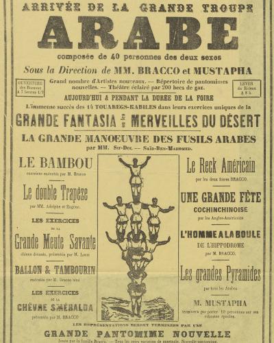 A vintage French theatrical poster advertising the arrival of the "Grande Troupe Arabe" for performances during the fair in Caen.