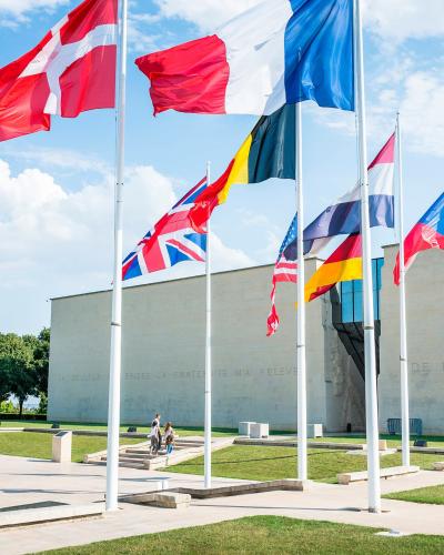 Flags outside the Mémorial de Caen museum