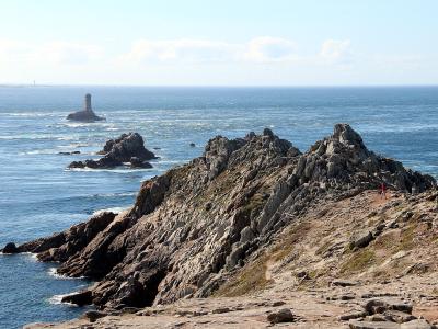 Rocky headland at the Pointe du Raz near Plogoff, with La Vieille rock in the sea