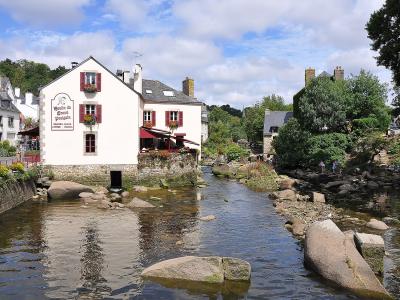 Moulin du Grand Poulguin, a stone mill building on the river Aven in Pont-Aven, Brittany, France.