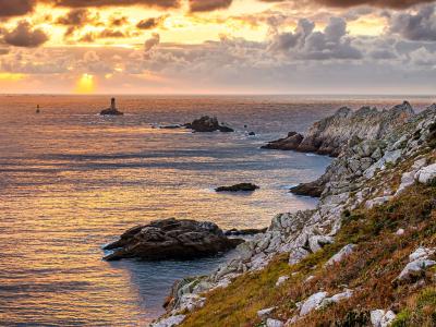 Sunset over the Pointe du Raz and the La Vieille lighthouse