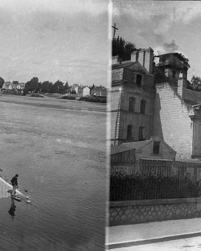 A black-and-white stereoscopic photograph showing a wide river with a stone bridge in the distance on the left panel, and a large castle complex on a hill overlooking a town square on the right panel.