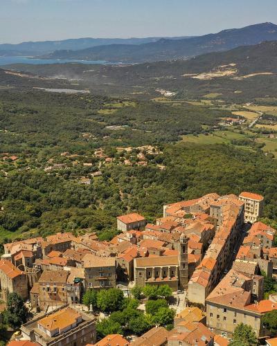 The granite old town of Sartène above its Corsican valley