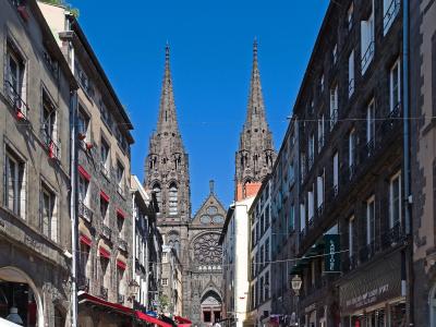 Rue des Gras in Clermont-Ferrand old town, leading up to the black-stone cathedral